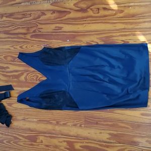 I'm selling a small dark blue dress!!! It has lace over the side of the dress.